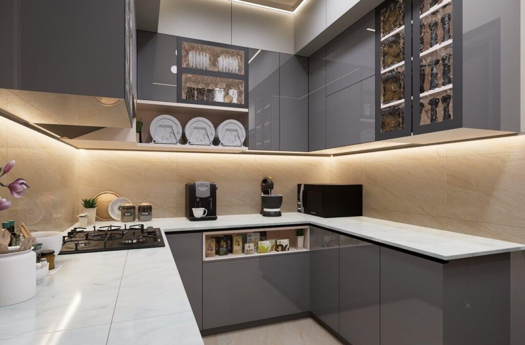 Sleek and modern kitchen with grey cabinets and marble countertops, featuring lighting.