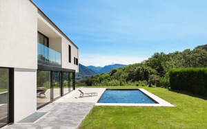 The Summer Landscaping Mistakes Families Make After Installing a Pool